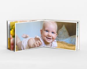 Layflat fotobok liggende L med hardt omslag